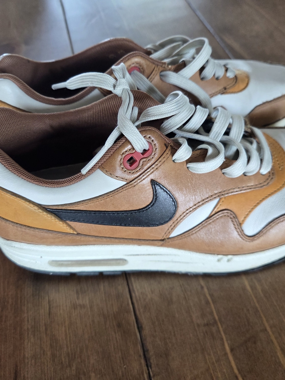 Nike Leather Swoosh Sneakers in Brown, White & Black